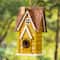 Glitzhome® 12" Retro Yellow Distressed Cottage Birdhouse